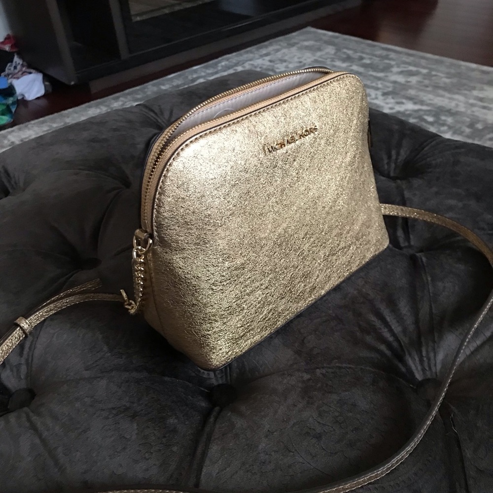 Michael Kota crows body purse brand new